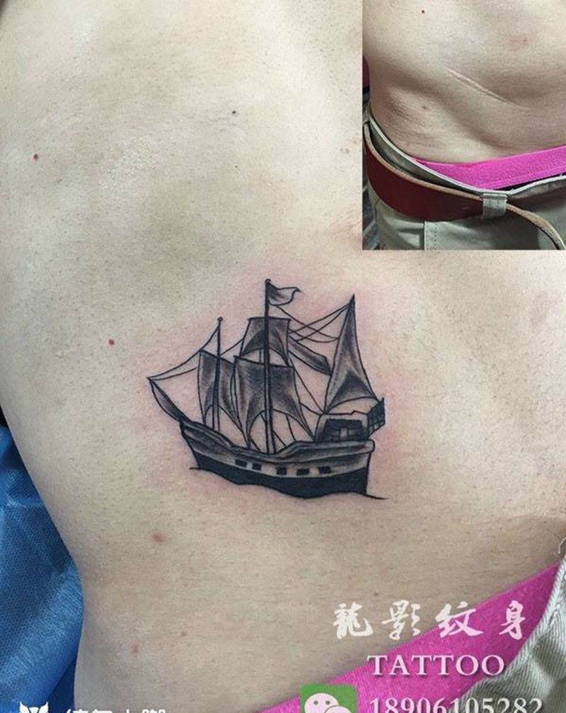 盖疤小船纹身图片