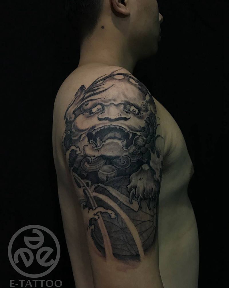 大臂唐狮纹身图片_成品纹身图案