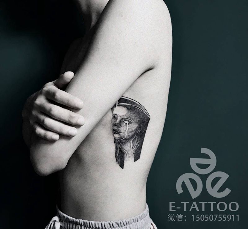 内心的纠结纹身图片