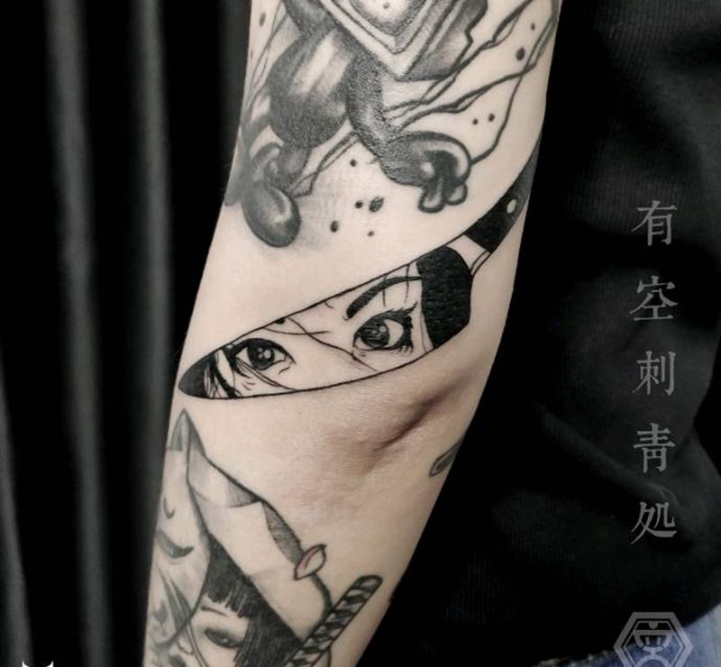 刀影纹身图片_图腾纹身图案