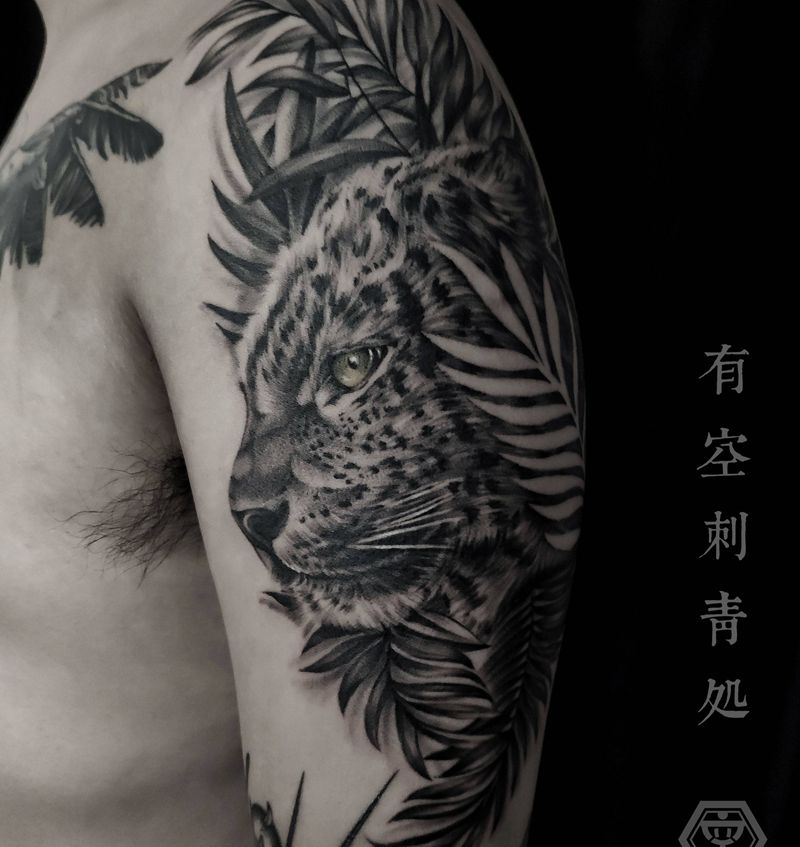 丛林豹纹身图片_手臂欧美写实纹身图案