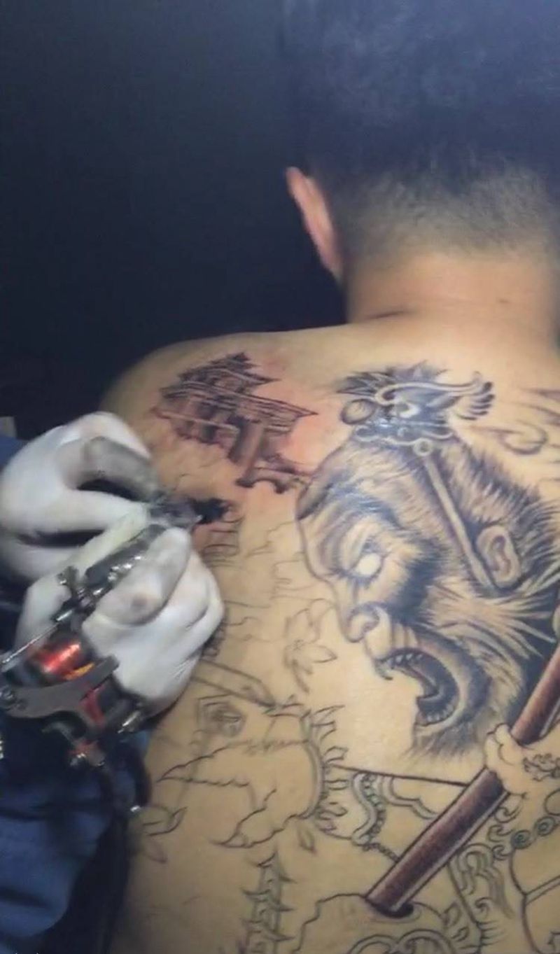 猴未完纹身图片