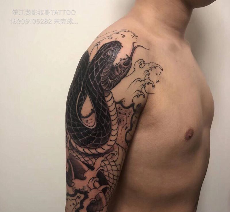 蛇纹身图片_手臂纹身图案