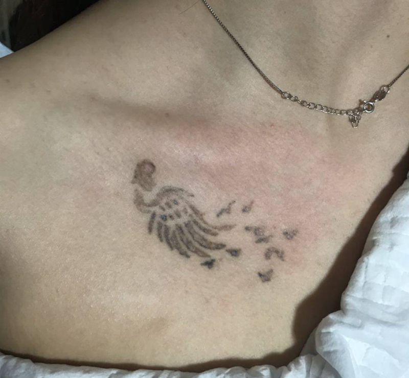 遮盖纹身图片_胸部纹身图案