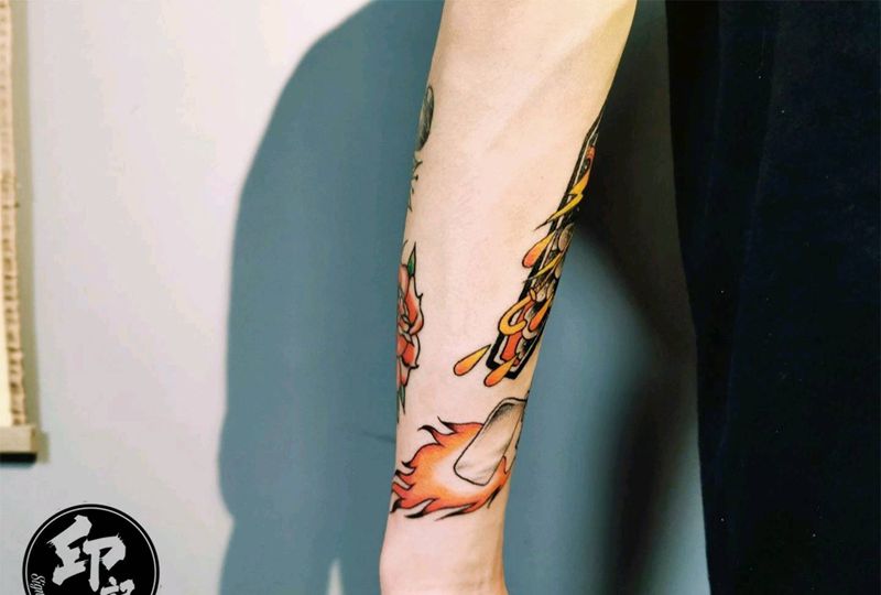 不知道是不是zippo纹身图片_手臂纹身图案