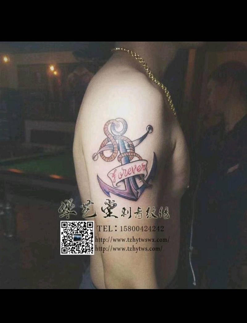 胳膊上小彩图纹身图片