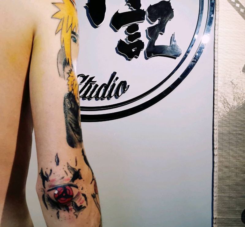 写轮眼纹身图片_手臂纹身图案