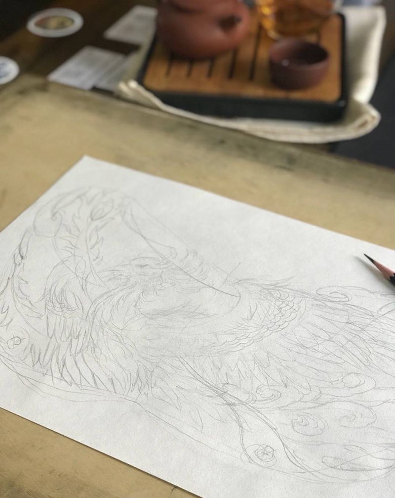 重庆的帅哥，您的定金收到，给您的火凤凰花胸起稿，谢谢信任[愉快][愉快]纹身图片