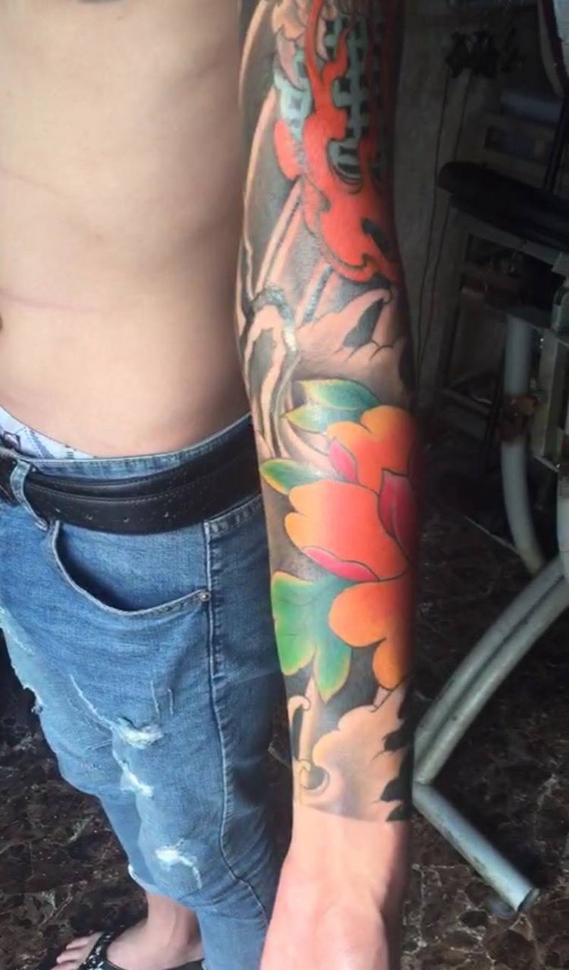 花臂未完纹身图片
