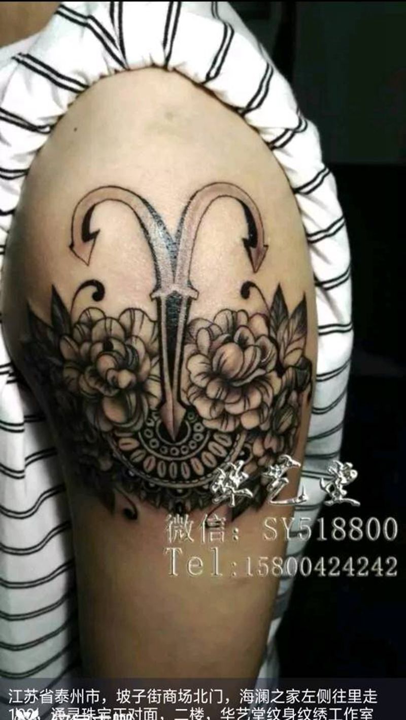 胳膊中图纹身图片