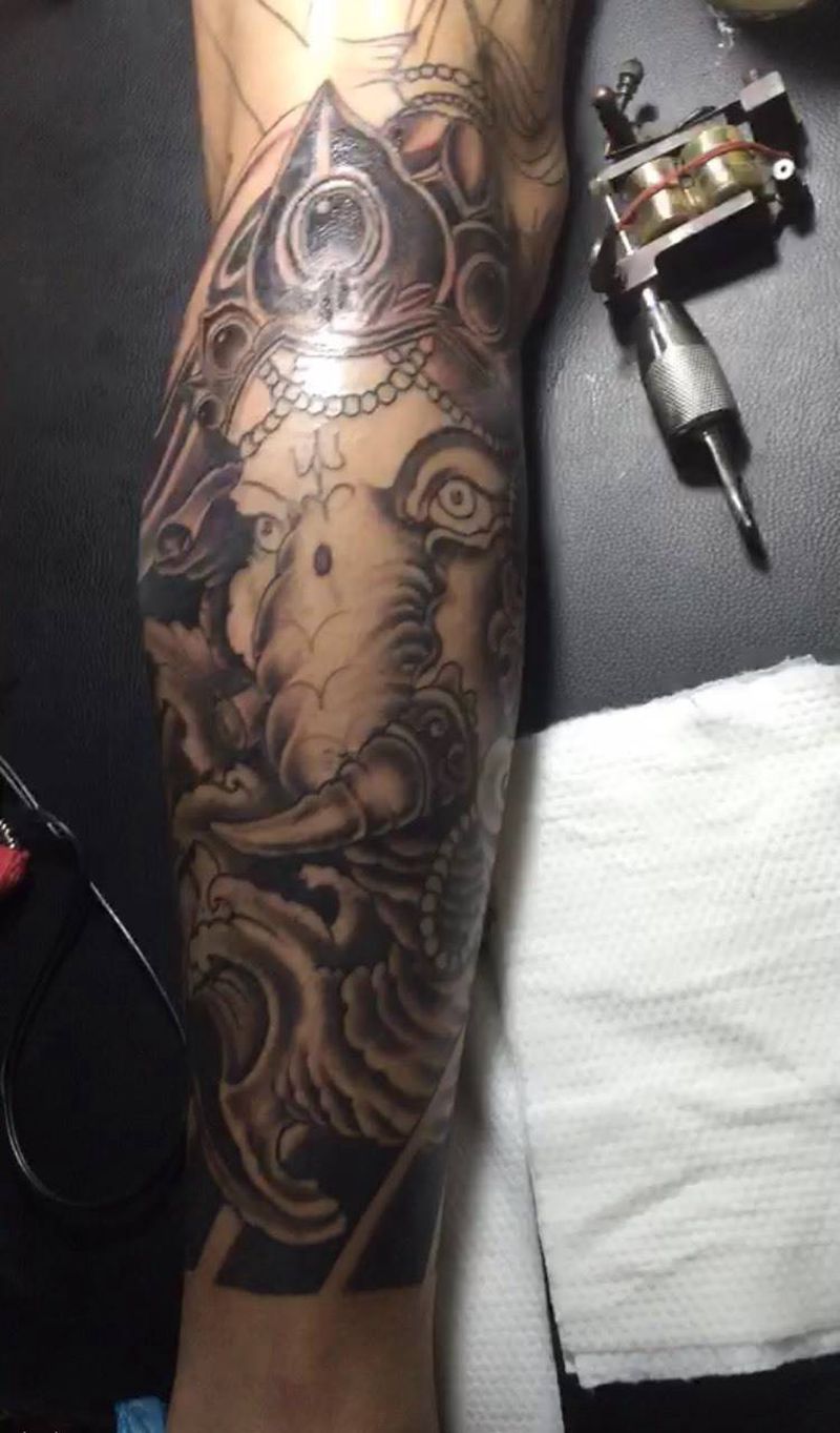象神未完纹身图片