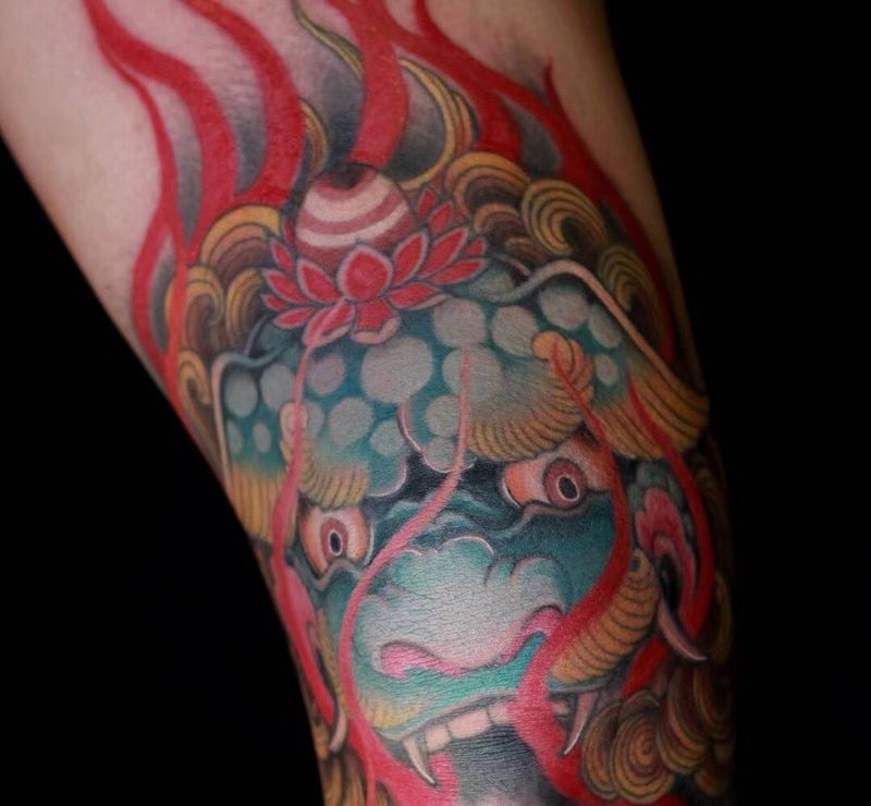 包膝唐狮纹身图片