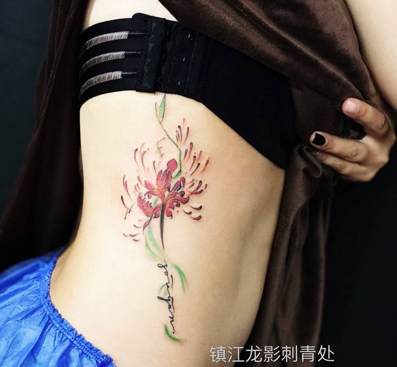 一支彼岸花，这个部位刺图累手[偷笑]谢谢美女的信任纹身图片