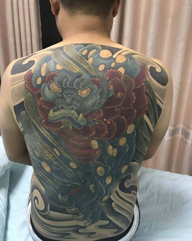 唐狮遮盖 大龙纹身图片