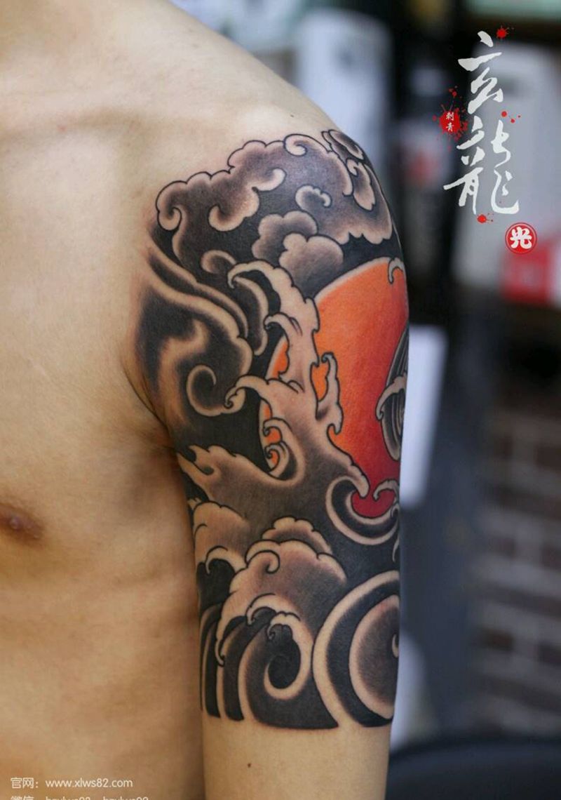 水浪大臂纹身图片