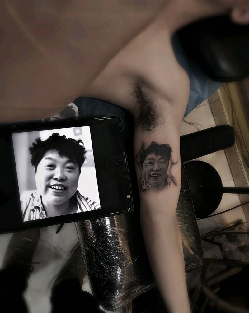 肖像纹身图片_手臂欧美写实纹身图案