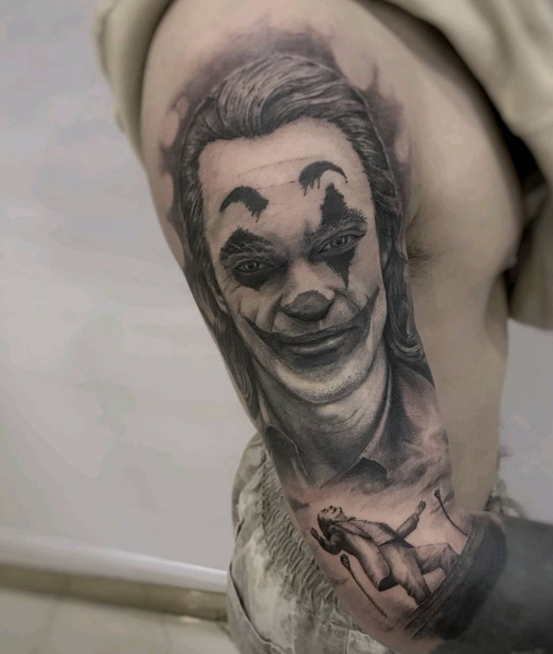 小丑纹身图片_手臂欧美写实纹身图案