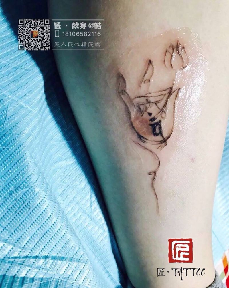 烟丝佛手种子字纹身图片_腿部国画宗教原创纹身图案