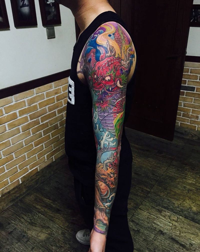 彩色花臂即将完成纹身图片_成品手稿手臂手部传统动物原创纹身图案