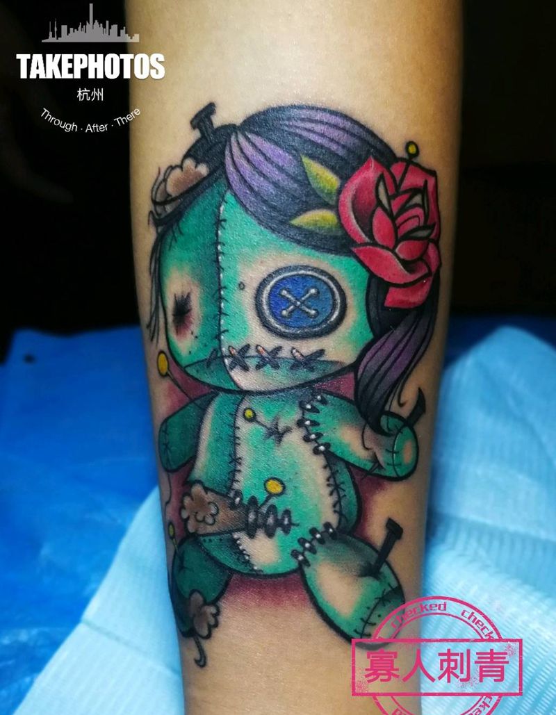 娃娃纹身图片_手臂纹身图案