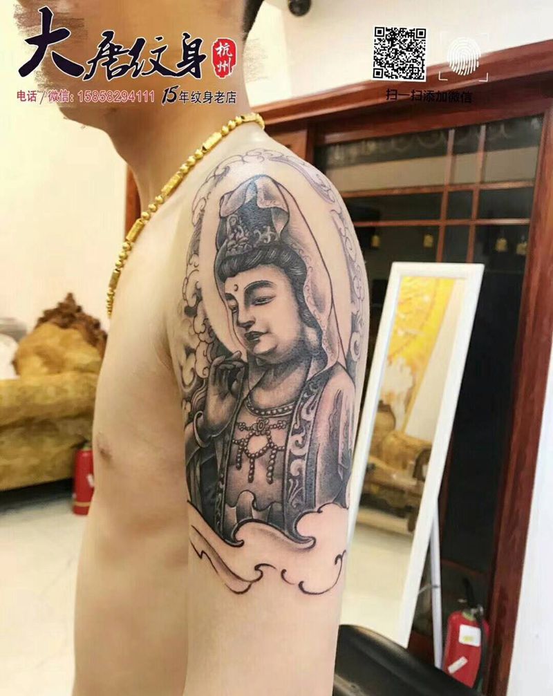 大臂关音纹身图片