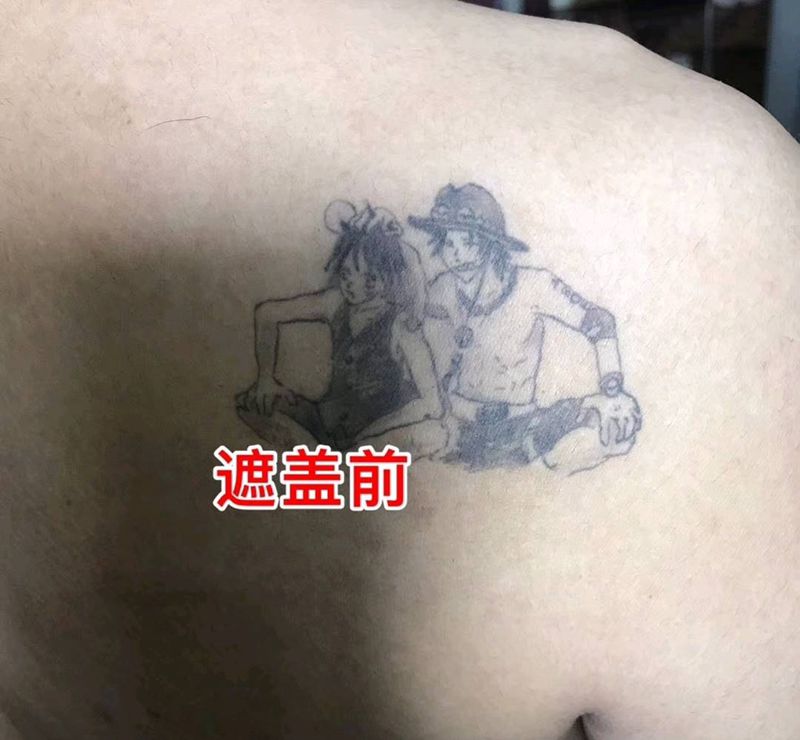 遮盖纹身图片_背部欧美写实纹身图案