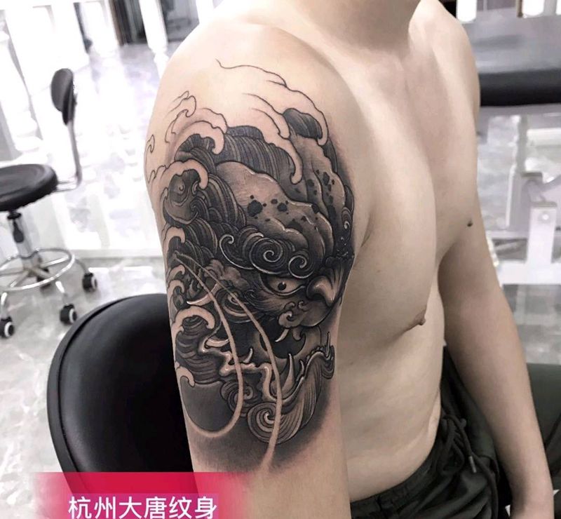唐狮纹身图片_手臂老传统纹身图案