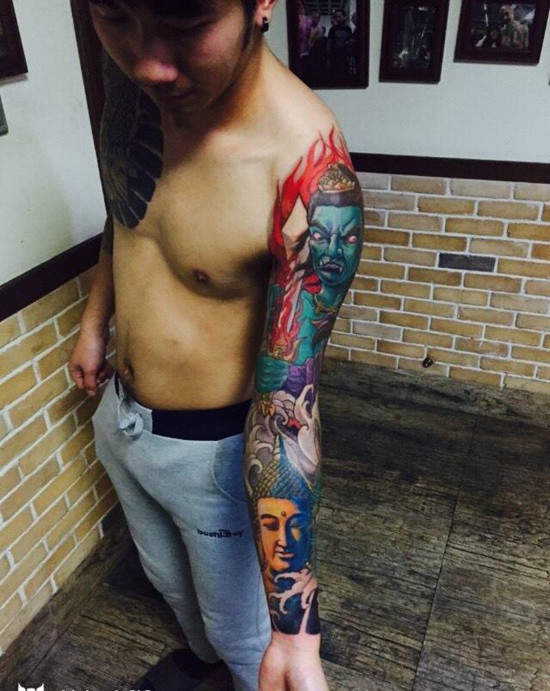 不动明王佛头花臂纹身图片_成品手臂手部传统肖像宗教纹身图案