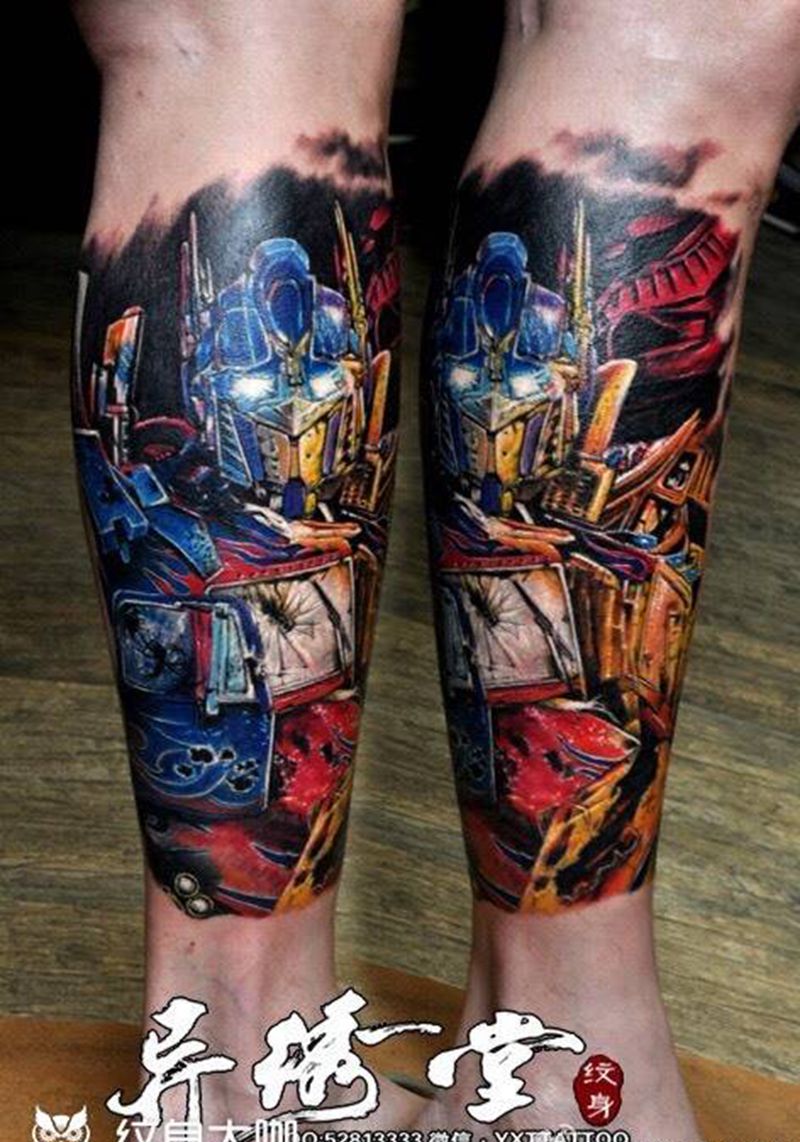 变形金刚纹身图片_成品腿部脚部欧美肖像写实人物汽车人纹身图案