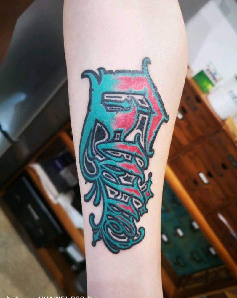 奇卡诺纹身图片_手臂花体字纹身图案