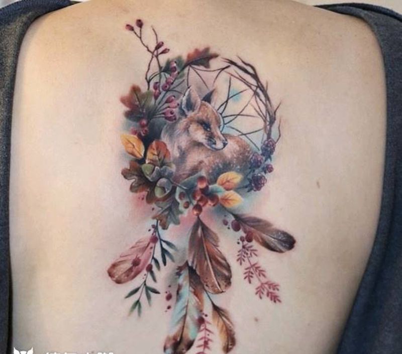 扑梦网纹身图片_背部水彩纹身图案