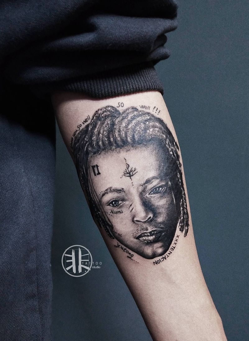 写实肖像纹身图片_手臂欧美写实肖像说唱歌手纹身图案