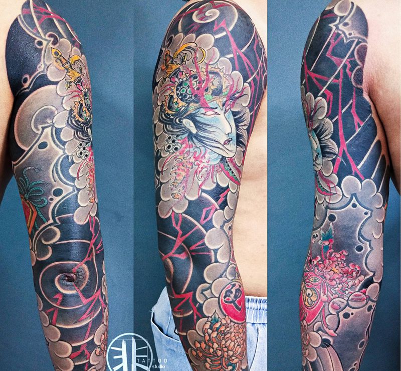 老传统花臂纹身图片_手臂肩部老传统生首达摩蛋日式老传统纹身图案