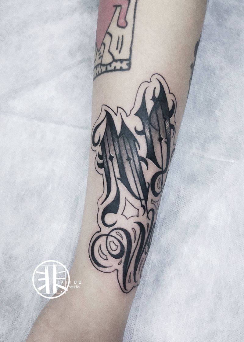 花体字纹身图片_手臂花体字奇卡诺花体花体字纹身图案