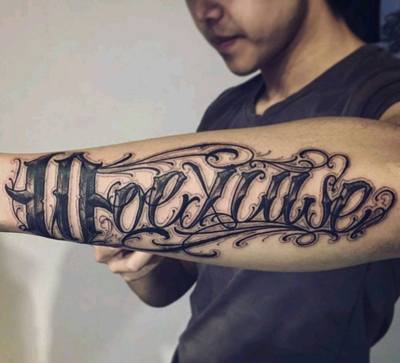 花体字纹身图片_手臂花体字纹身图案