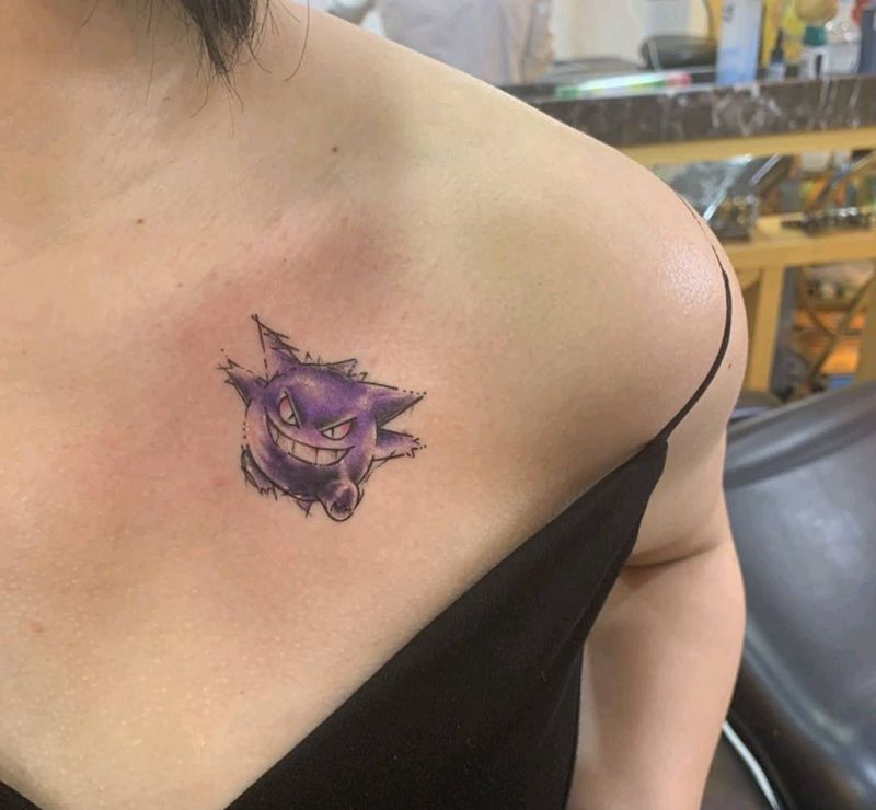 卡通纹身纹身图片_胸部水彩纹身图案