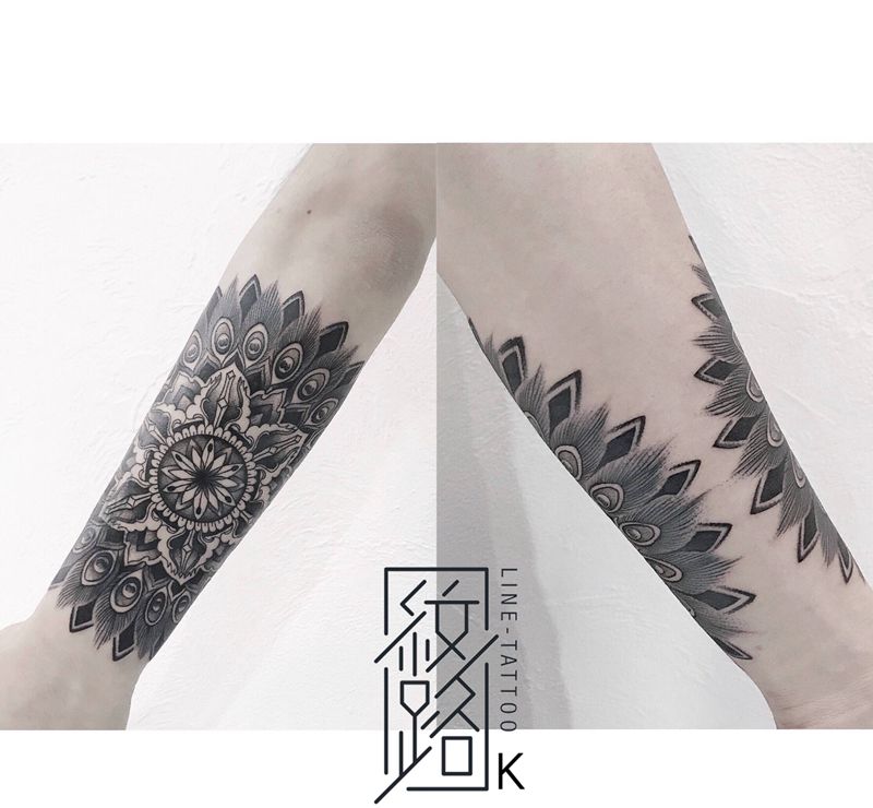 梵花纹身图片_手臂点刺几何纹身图案