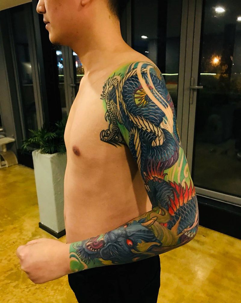 龙花臂纹身图片_手稿手臂手部传统动物图腾宗教原创纹身图案