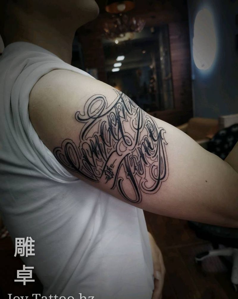 花体字纹身图片_手臂花体字纹身图案