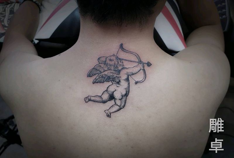 Peter 丘纹身图片_颈部肩部New School丘比特纹身图案