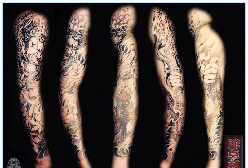 不动明王接花臂纹身图片_手臂传统鬼神宗教花臂不动明王纹身图案