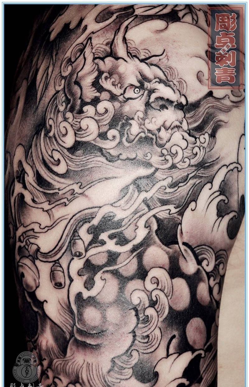 唐狮盖疤纹身图片_成品手臂传统动物修改遮盖唐狮纹身图案
