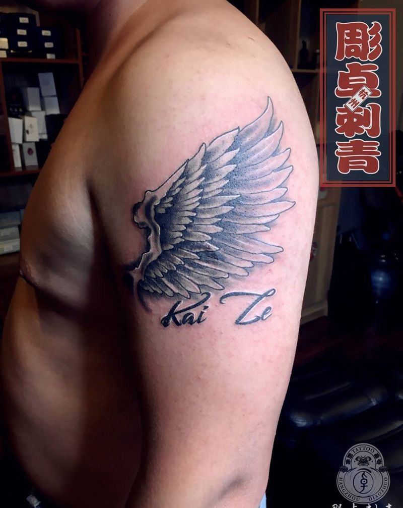 翅膀盖疤纹身图片_成品手臂杭州翅膀疤痕遮盖纹身图案