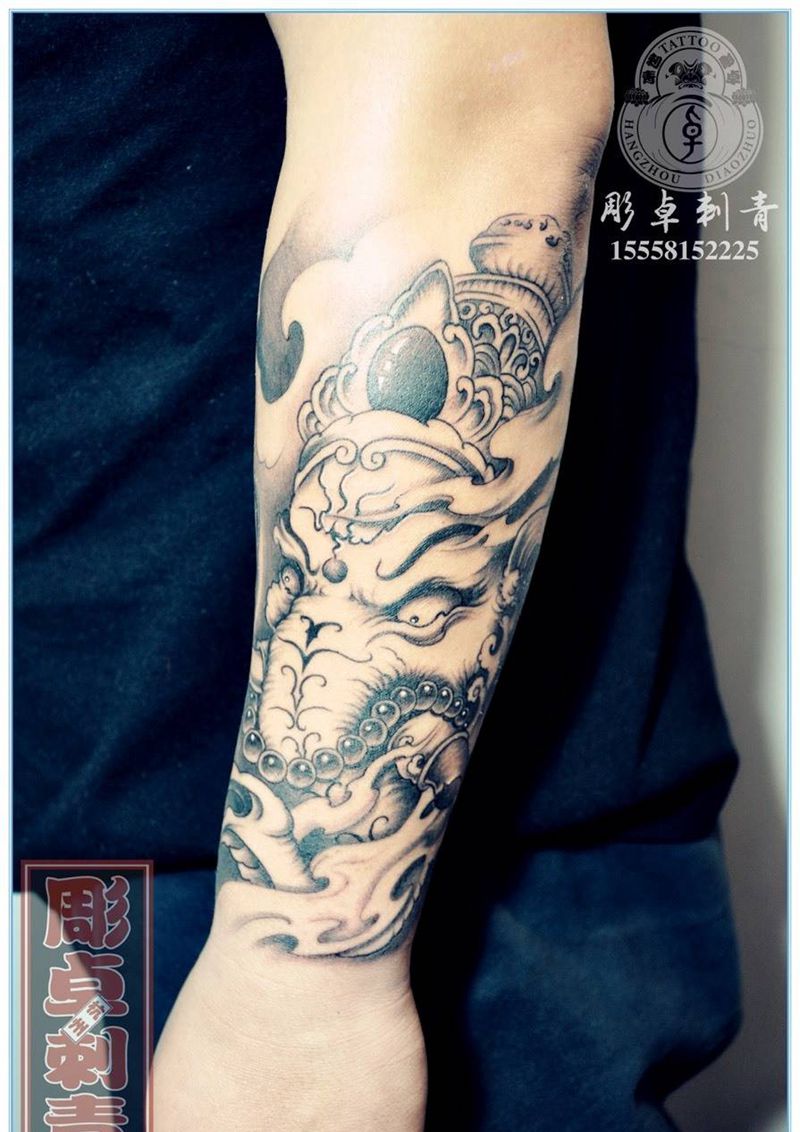 象神包小臂纹身图片_成品手臂传统鬼神宗教象神包小臂杭州纹身图案