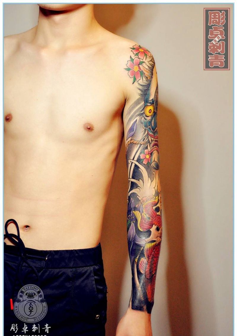 修改般若鲤鱼花臂纹身图片_成品传统般若 鲤鱼花臂杭州修改遮盖纹身图案