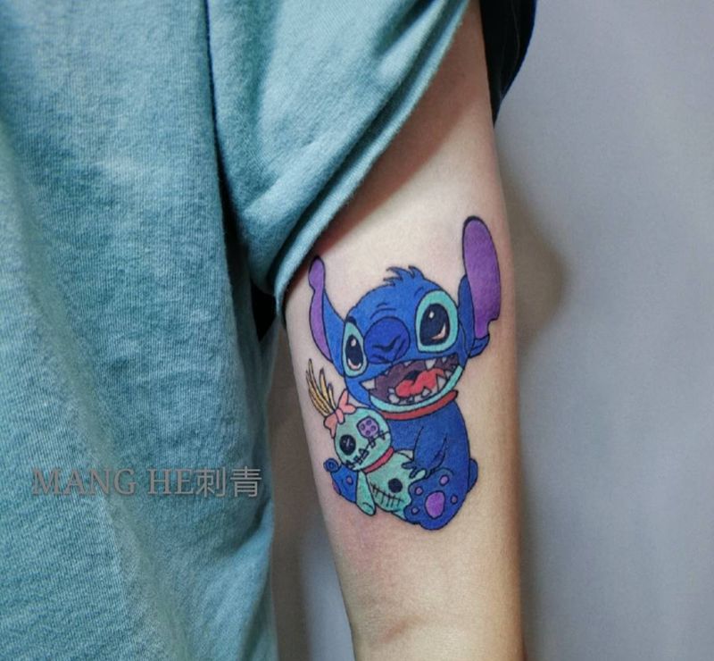 史迪仔纹身图片_手臂卡通史迪仔纹身图案