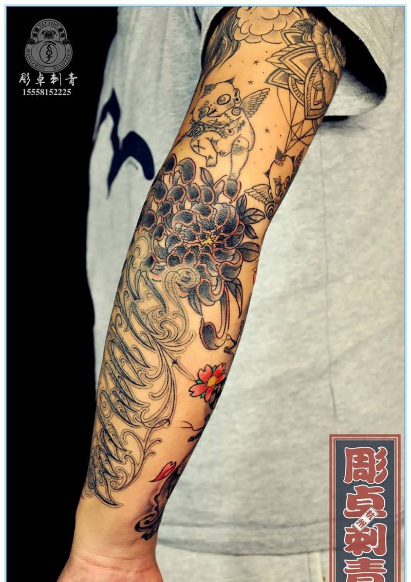 手肘菊花纹身图片_成品手臂欧美植物菊花纹身图案