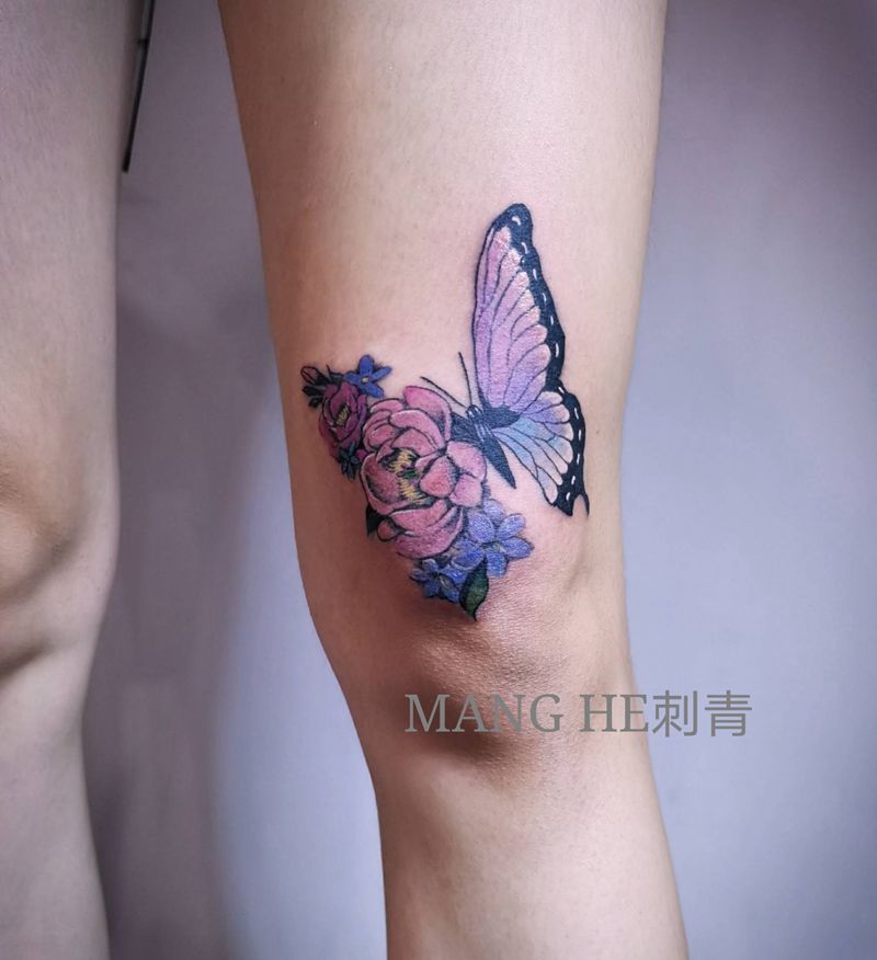 蝴蝶纹身图片_腿部欧美写实水彩遮盖纹身图案