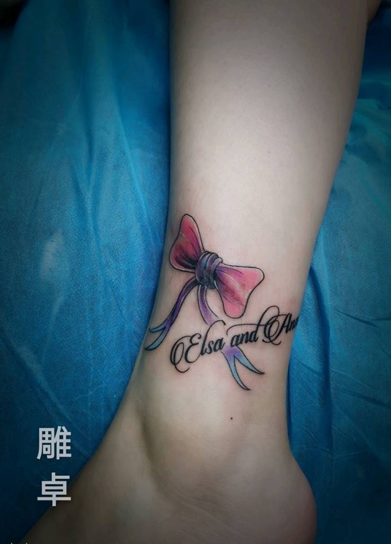 蝴蝶结盖疤纹身图片_脚部腿部New School花体字蝴蝶结纹身图案