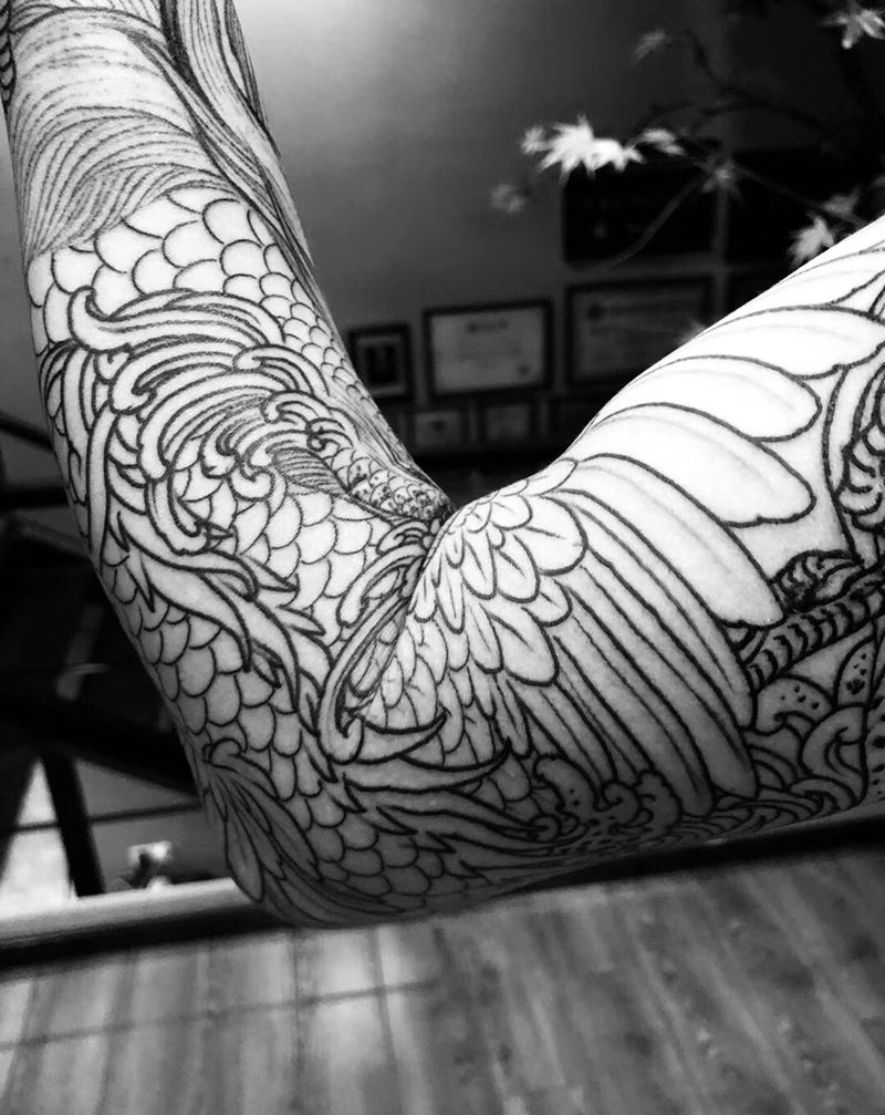 凤凰花臂纹身图片